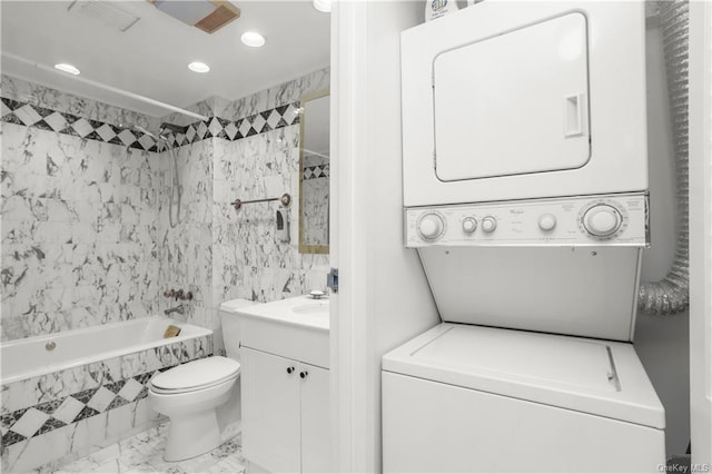 1374 Midland Ave Unit Ph07, Bronxville, NY 10708 - full bathroom with stacked washing machine and dryer, vanity, tiled shower / bath, marble finish flooring, and recessed lighting
