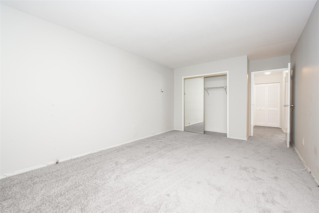 1374 Midland Ave Unit Ph07, Bronxville, NY 10708 - unfurnished bedroom featuring light carpet and a closet