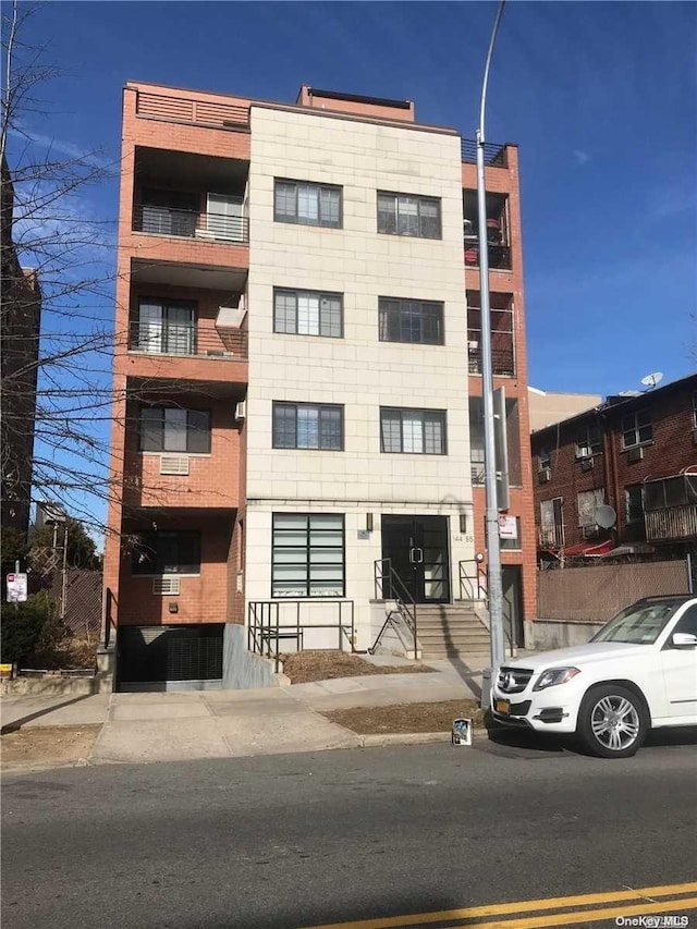 144-85 Roosevelt Ave Unit 5E, Flushing, NY 11354 - view of apartment building / complex
