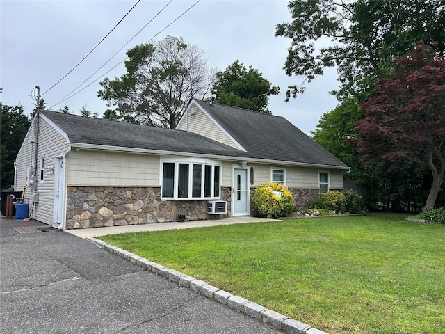 166 W 2nd St, West Islip, NY 11795 - ranch-style home featuring stone siding, a front lawn, and a shingled roof