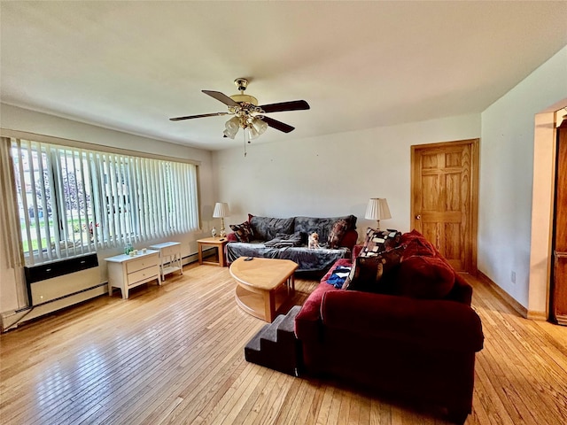 166 W 2nd St, West Islip, NY 11795 - living room with light wood finished floors and ceiling fan