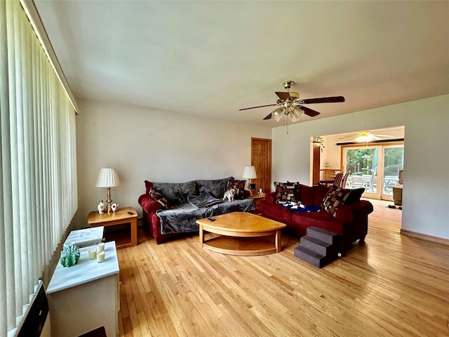 166 W 2nd St, West Islip, NY 11795 - living area with light wood finished floors and a ceiling fan