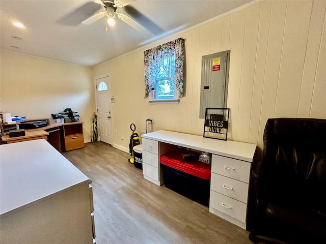 166 W 2nd St, West Islip, NY 11795 - office area featuring electric panel, wood finished floors, a ceiling fan, and ornamental molding