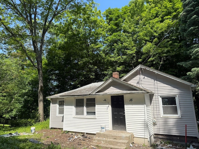 6 Hillcrest Trl, Monroe, NY 10950 - bungalow-style house featuring entry steps and a chimney