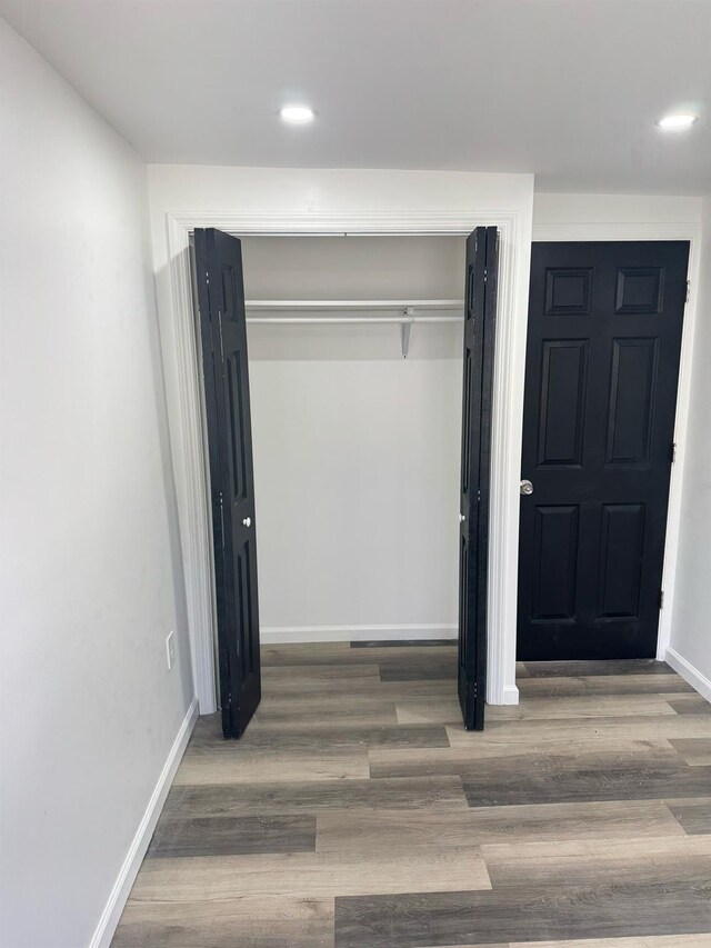 6 Hillcrest Trl, Monroe, NY 10950 - unfurnished bedroom with a closet, wood finished floors, and recessed lighting