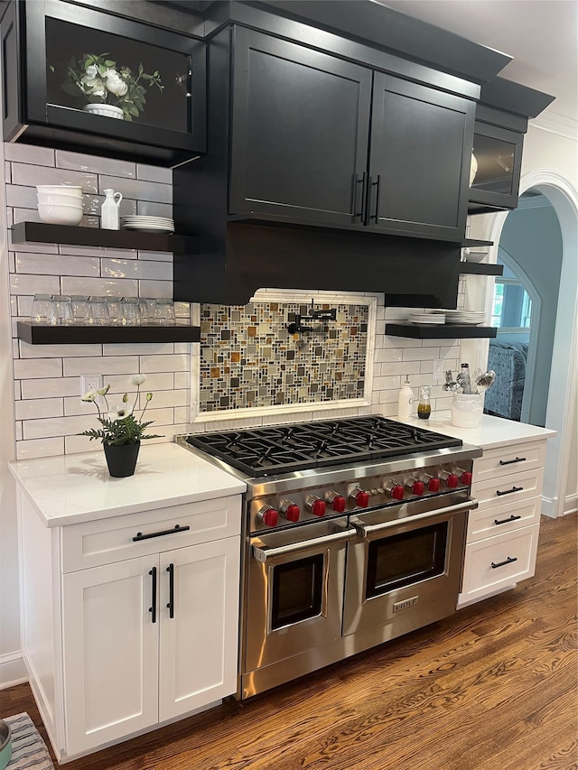 5 Odell Dr, Stony Point, NY 10980 - kitchen with range with two ovens, dark wood finished floors, tasteful backsplash, and light countertops