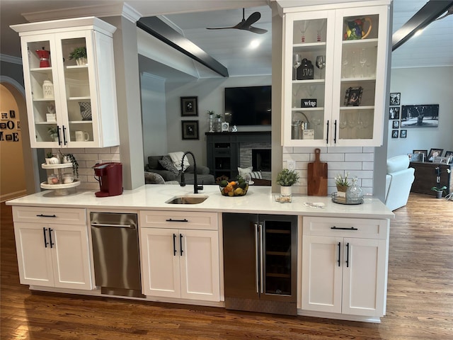 5 Odell Dr, Stony Point, NY 10980 - bar with beverage cooler, backsplash, ornamental molding, and dark wood-style flooring