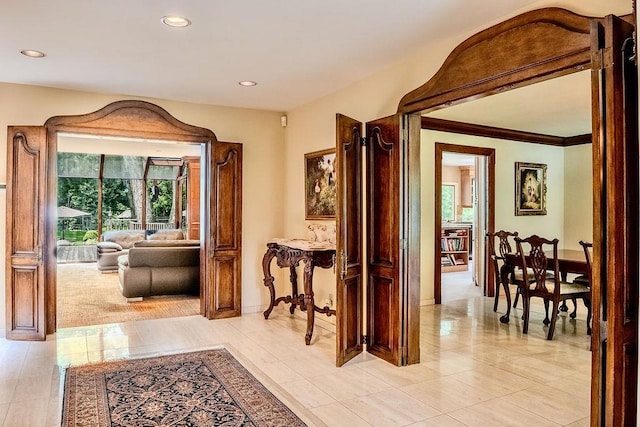 14 Pine Dr, Woodbury, NY 11797 - hallway featuring recessed lighting, crown molding, and light tile patterned flooring