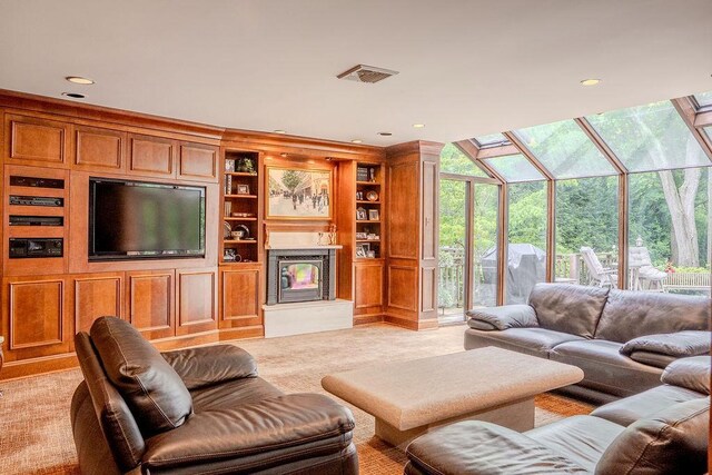 14 Pine Dr, Woodbury, NY 11797 - living room featuring a high end fireplace, expansive windows, light carpet, and recessed lighting