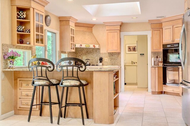 14 Pine Dr, Woodbury, NY 11797 - kitchen with light brown cabinets, premium range hood, a breakfast bar, open shelves, and recessed lighting