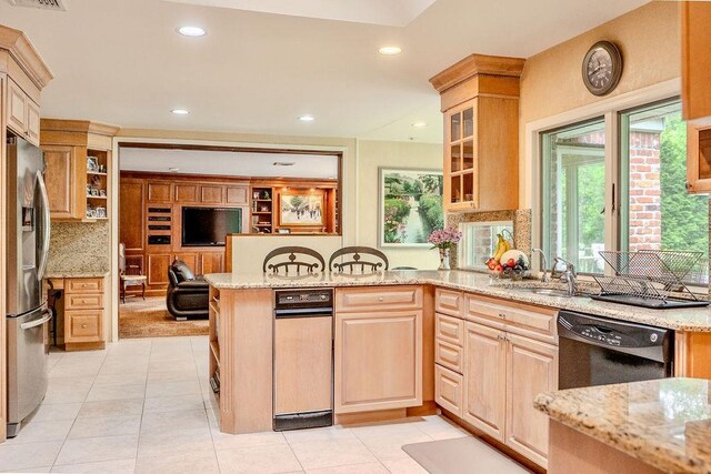 14 Pine Dr, Woodbury, NY 11797 - kitchen featuring stainless steel fridge with ice dispenser, a peninsula, dishwasher, light stone countertops, and backsplash