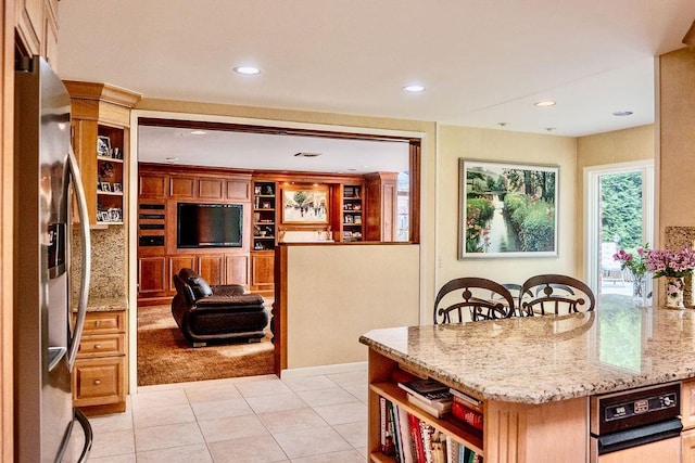 14 Pine Dr, Woodbury, NY 11797 - kitchen featuring stainless steel fridge, open shelves, light stone counters, recessed lighting, and light tile patterned flooring