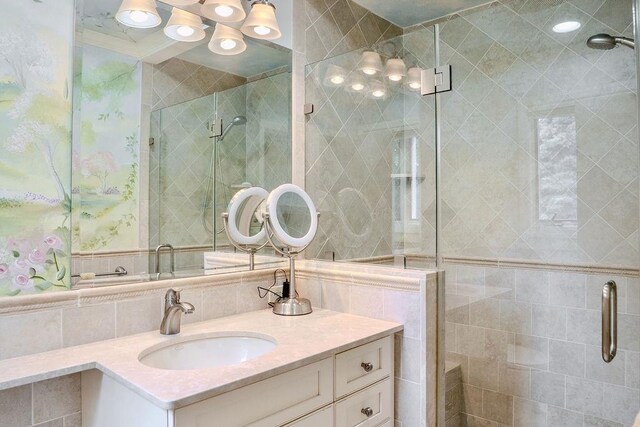 14 Pine Dr, Woodbury, NY 11797 - bathroom featuring vanity, a stall shower, and tile walls
