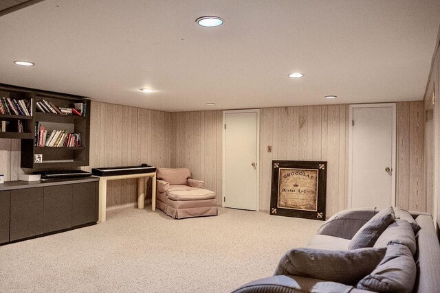 14 Pine Dr, Woodbury, NY 11797 - living room with carpet floors, recessed lighting, and wooden walls