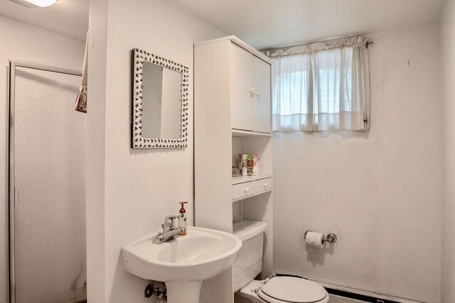 14 Pine Dr, Woodbury, NY 11797 - bathroom featuring a sink and toilet