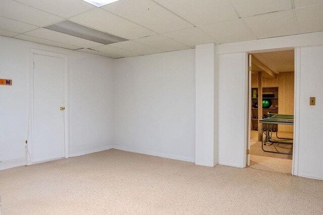14 Pine Dr, Woodbury, NY 11797 - below grade area with a drop ceiling and light carpet