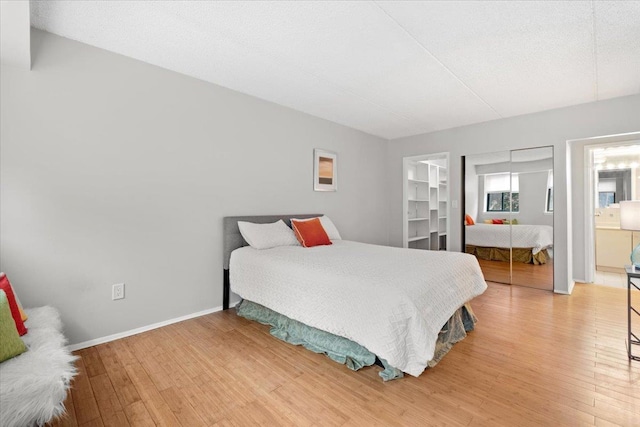66 Crisfield St Unit 2B, Yonkers, NY 10710 - bedroom with light wood-type flooring and baseboards
