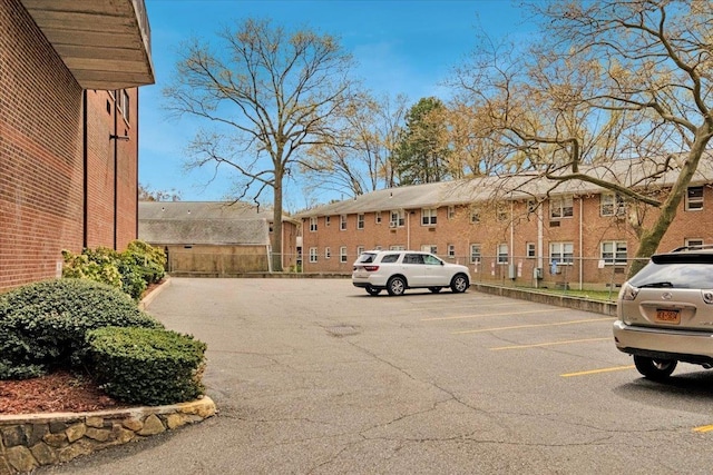 66 Crisfield St Unit 2B, Yonkers, NY 10710 - uncovered parking lot with a residential view