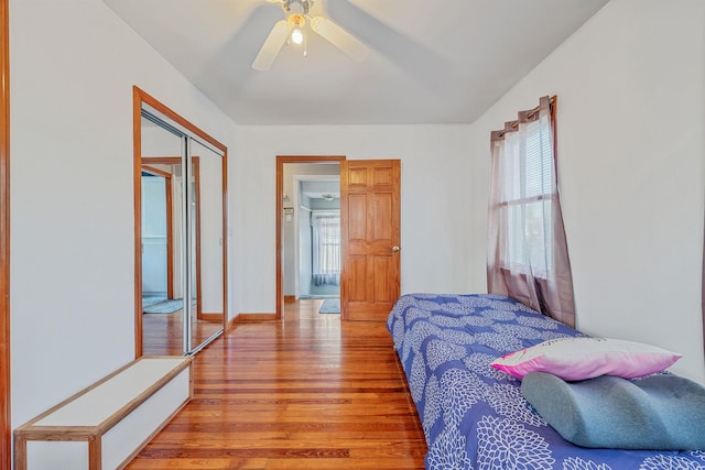42 S Montague St, Valley Stream, NY 11580 - bedroom featuring multiple windows, light wood-style flooring, a closet, and ceiling fan