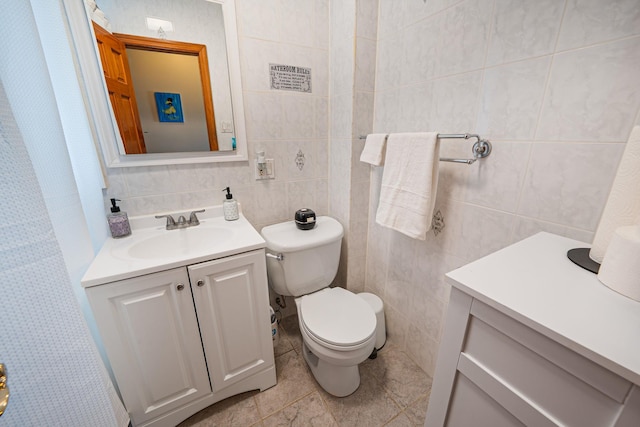 42 S Montague St, Valley Stream, NY 11580 - bathroom featuring vanity and tile walls