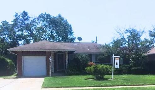 788 Dean Dr, Baldwin, NY 11510 - ranch-style house featuring driveway, a front lawn, and an attached garage