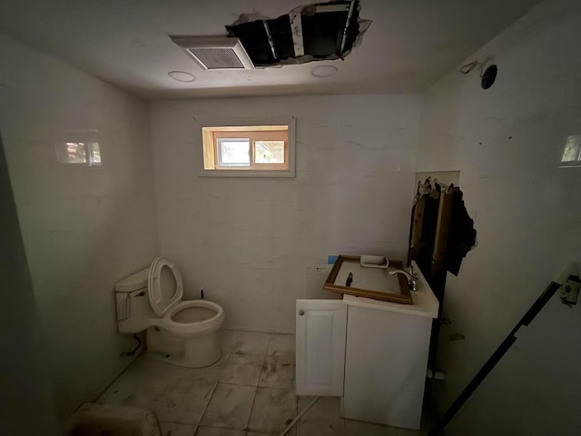 788 Dean Dr, Baldwin, NY 11510 - bathroom featuring toilet and vanity