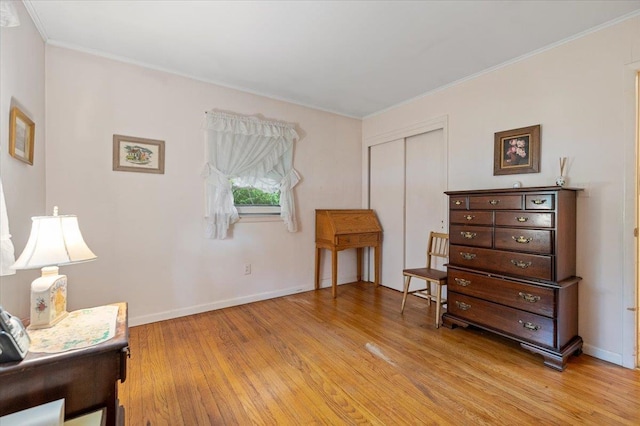 241 Hampton St, East Hampton, NY 11963 - living area featuring light wood finished floors and ornamental molding