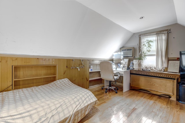 1464 Potter Blvd, Bay Shore, NY 11706 - bedroom featuring vaulted ceiling, light wood-style flooring, a desk, and a wall mounted air conditioner