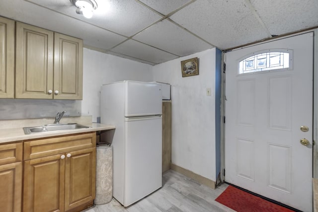 1464 Potter Blvd, Bay Shore, NY 11706 - kitchen with freestanding refrigerator, a paneled ceiling, light wood finished floors, and light countertops