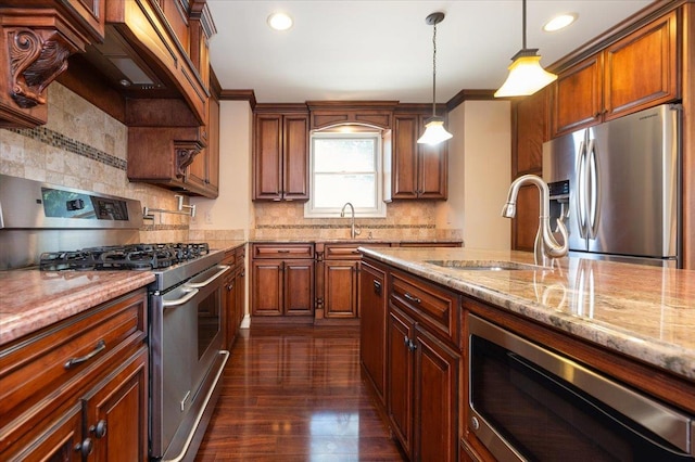 403 S 1st St, Lindenhurst, NY 11757 - kitchen with stainless steel appliances, tasteful backsplash, light stone counters, hanging light fixtures, and recessed lighting