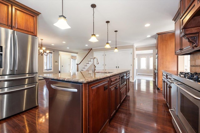 403 S 1st St, Lindenhurst, NY 11757 - kitchen with stainless steel appliances, ornamental molding, light stone countertops, dark wood-style floors, and range hood