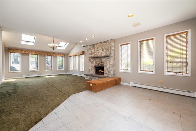 403 S 1st St, Lindenhurst, NY 11757 - unfurnished living room featuring a baseboard heating unit, a fireplace, a skylight, carpet flooring, and vaulted ceiling