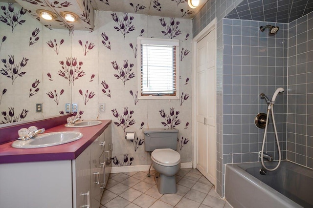 403 S 1st St, Lindenhurst, NY 11757 - bathroom featuring tile patterned flooring, double vanity, and washtub / shower combination