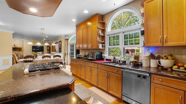 59 Lidge Dr, Farmingville, NY 11738 - kitchen featuring stainless steel appliances, open shelves, brown cabinetry, open floor plan, and crown molding