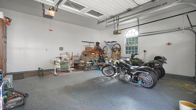 59 Lidge Dr, Farmingville, NY 11738 - garage featuring a garage door opener