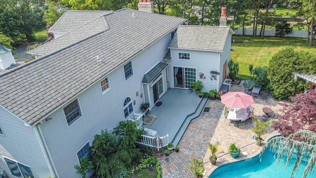 59 Lidge Dr, Farmingville, NY 11738 - view from above of property featuring a pool area and a tree filled landscape