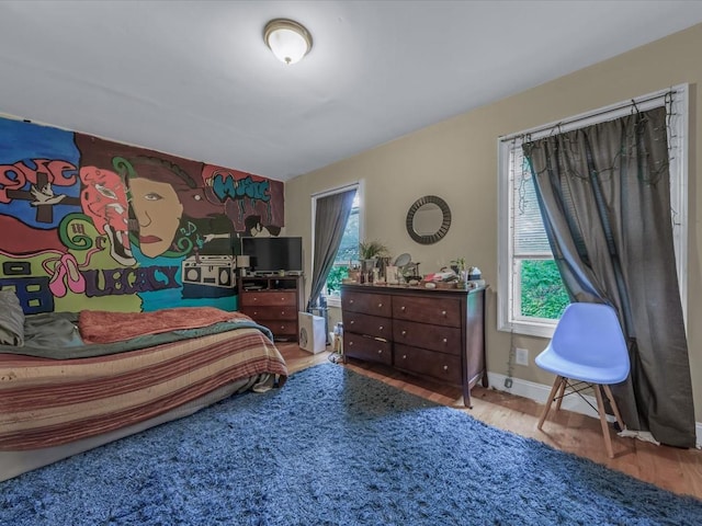 2677 Heath Ave, Bronx, NY 10463 - bedroom featuring wood finished floors and baseboards