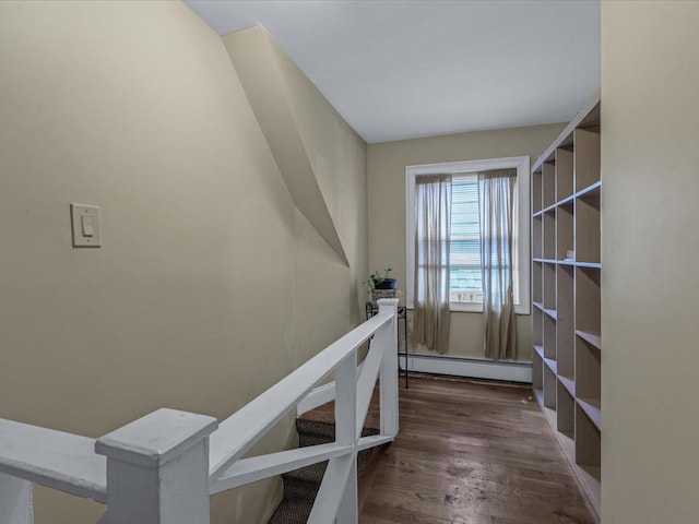 2677 Heath Ave, Bronx, NY 10463 - staircase featuring a baseboard radiator and wood finished floors