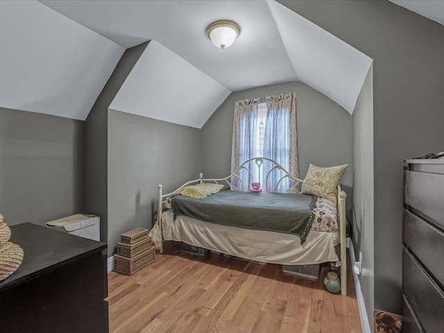 2677 Heath Ave, Bronx, NY 10463 - bedroom featuring wood finished floors and lofted ceiling