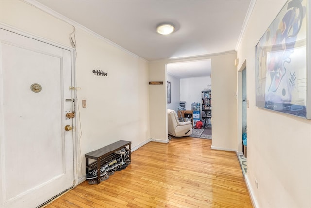 67-66 108th St Unit A58, Forest Hills, NY 11375 - hall with light wood finished floors and crown molding