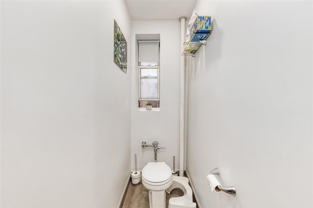 67-66 108th St Unit A58, Forest Hills, NY 11375 - bathroom featuring toilet and wood finished floors