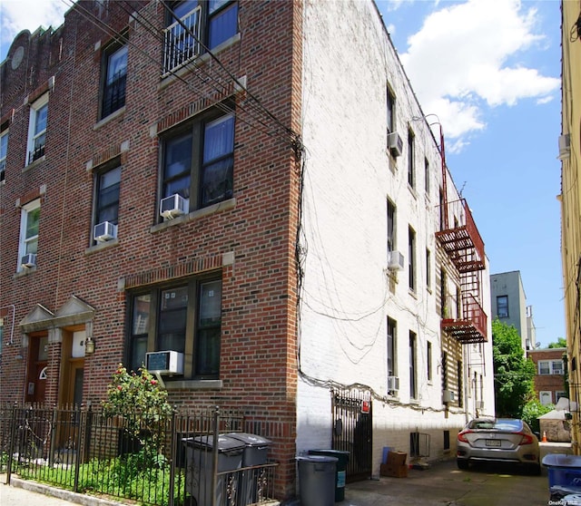 40-45 99th St, Corona, NY 11368 - view of apartment building / complex with cooling unit