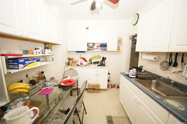 40-45 99th St, Corona, NY 11368 - kitchen with a ceiling fan, open shelves, and white cabinetry
