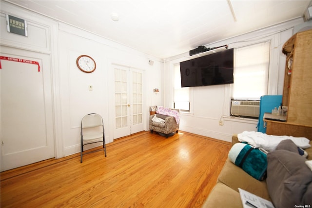 40-45 99th St, Corona, NY 11368 - living area with light wood-style floors and french doors