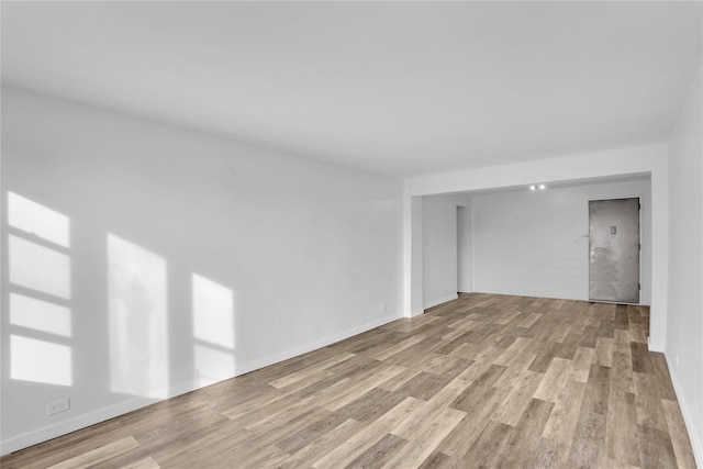 3184 Grand Unit 6D, Bronx, NY 10458 - unfurnished room featuring light wood-style floors