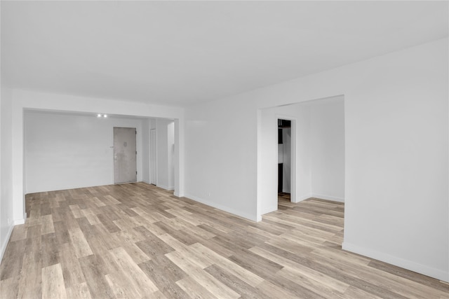 3184 Grand Unit 6D, Bronx, NY 10458 - empty room with light wood-style flooring and baseboards