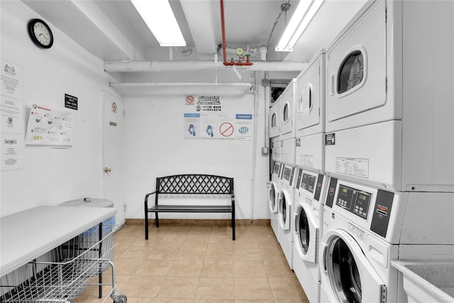 3184 Grand Unit 6D, Bronx, NY 10458 - shared laundry featuring stacked washing machine and dryer, separate washer and dryer, and light tile patterned flooring