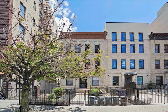 1363 Nostrand Ave, Brooklyn, NY 11226 - view of building exterior with a fenced front yard