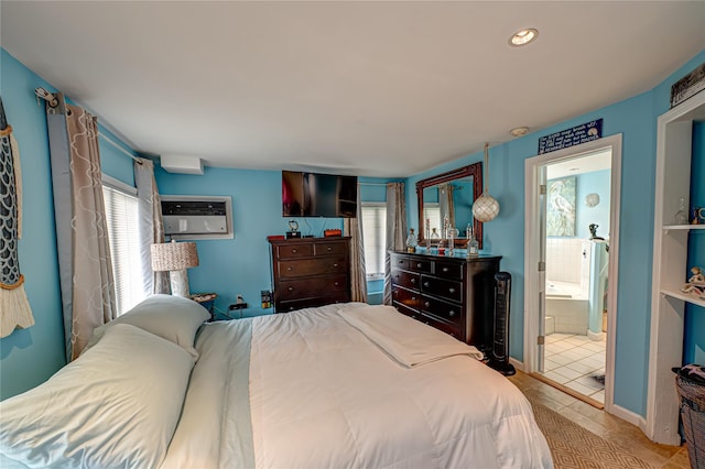 510 S Great Neck Rd, Copiague, NY 11726 - tiled bedroom featuring a wall unit AC, ensuite bathroom, and recessed lighting