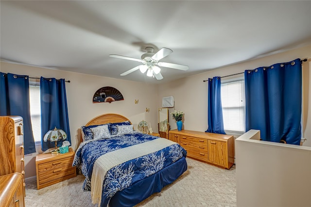510 S Great Neck Rd, Copiague, NY 11726 - bedroom with light colored carpet and a ceiling fan